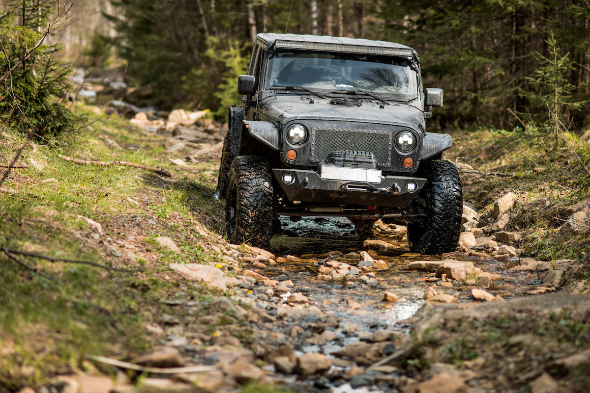 Driving down a hill in a Ford Bronco 2-Door