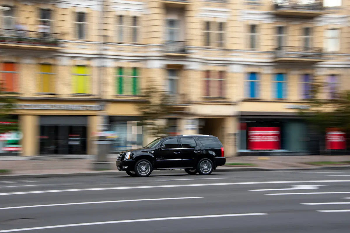 City driving in a Cadillac Escalade